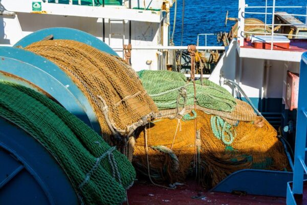 fishing-nets-boat-lake_1048944-15975813